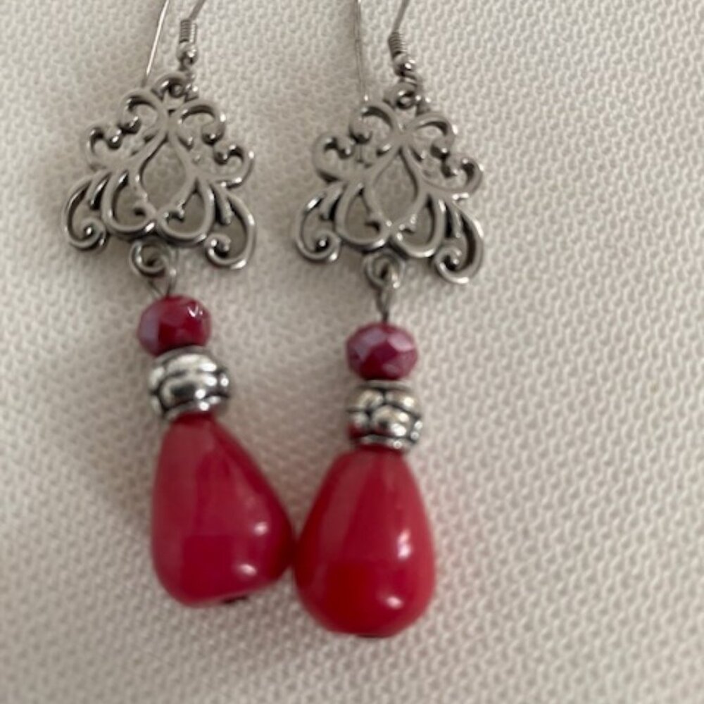 SILVER COLORED EARRINGS WITH RED STONES